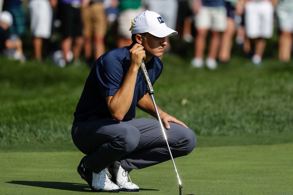 Jordan sizes up the break of his putt at the 2018 PGA Championship at Bellerive.