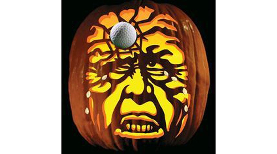 A classic spooky face, paired with a golf ball. Perfection!