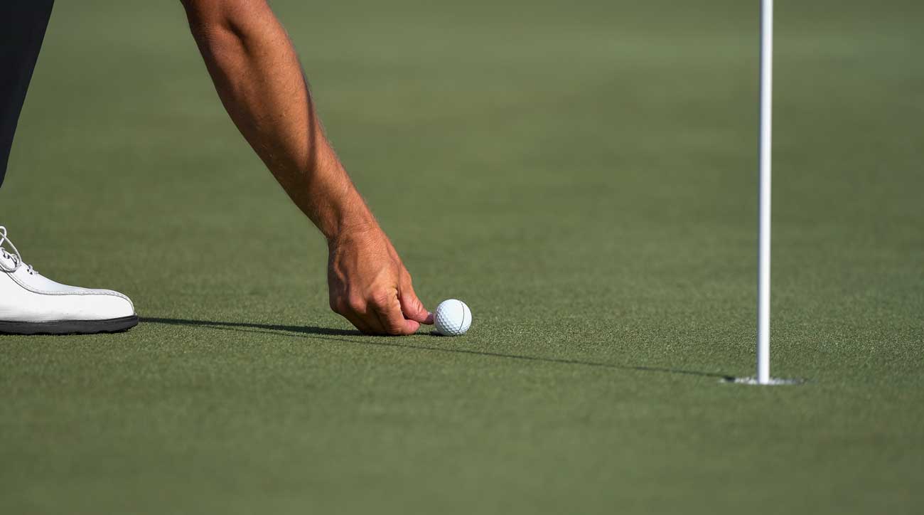Some PGA Tour players will not always rush to mark their balls like in this photo. 