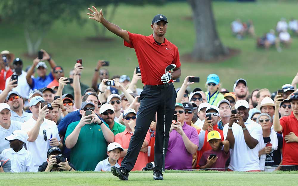 Tiger Woods watches a drive during the Tour Championship.