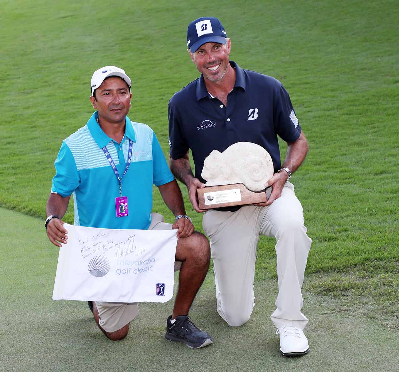 Matt Kuchar and El Tucan pose for a photo after their win. El Tucan said he cried when he held the trophy.