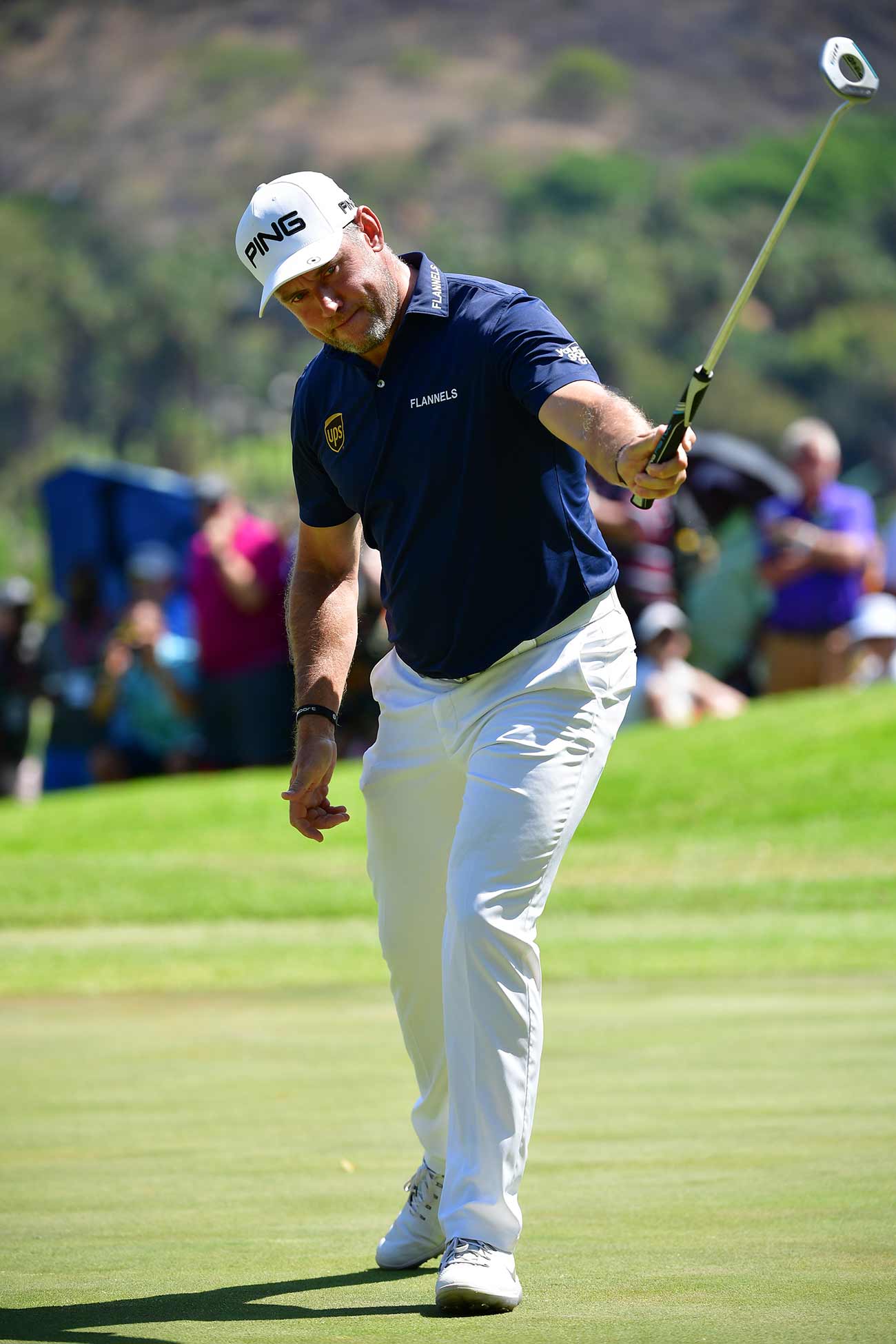 Lee Westwood holds up his putter during a stellar final round on Sunday.