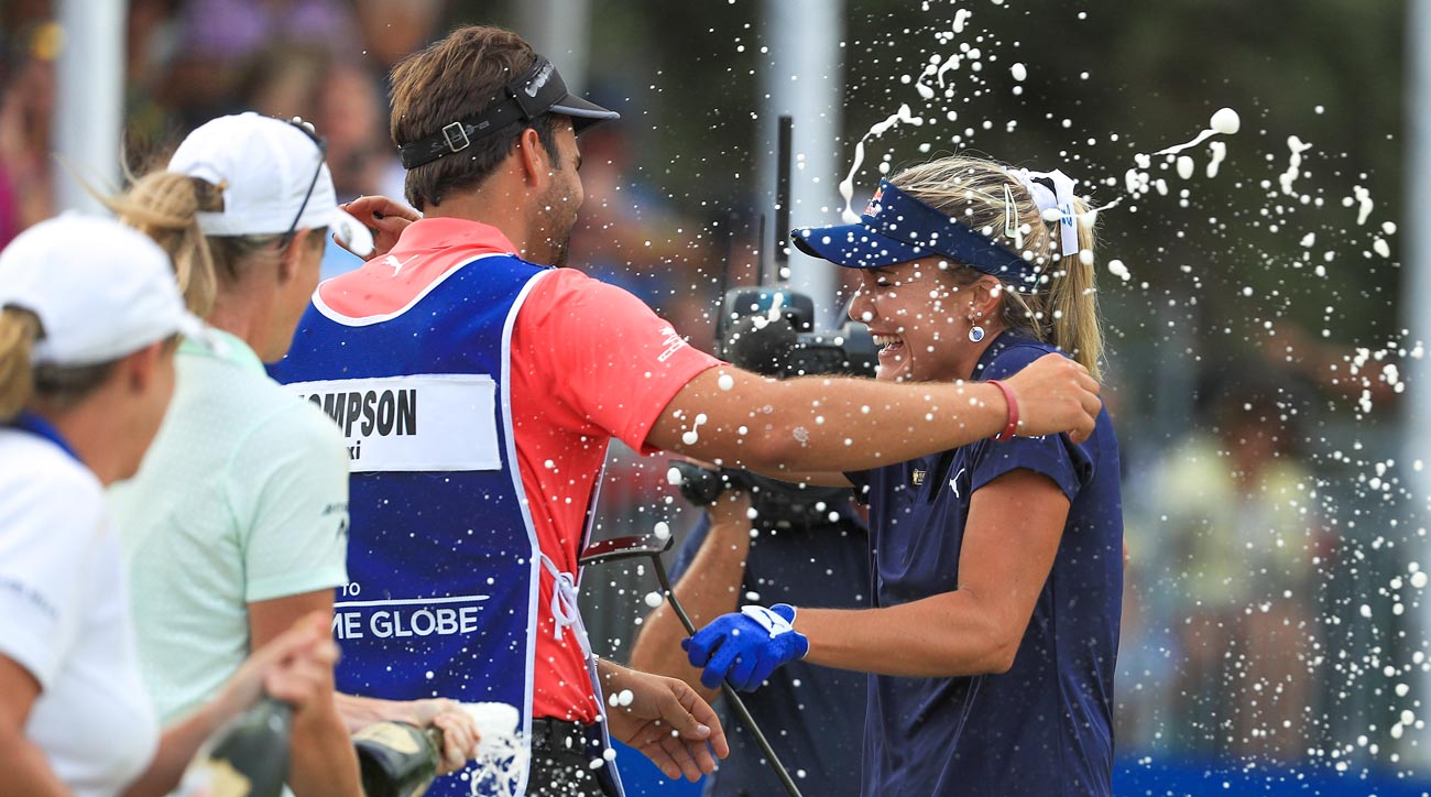 Lexi Thompson embraces her brother and caddie Curtis after her victory at the 2018 CME Group Tour Championship.