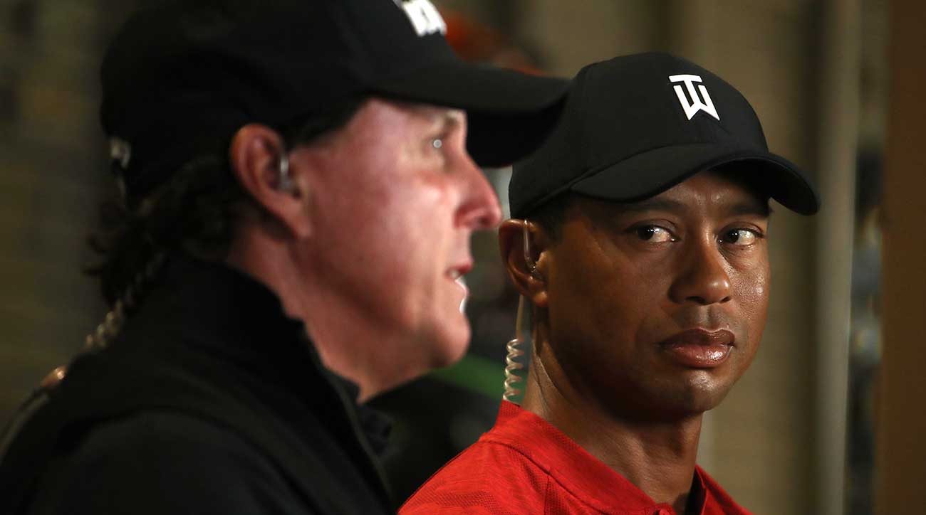 Tiger Woods stares at Phil Mickelson during their Tuesday press conference for The Match.