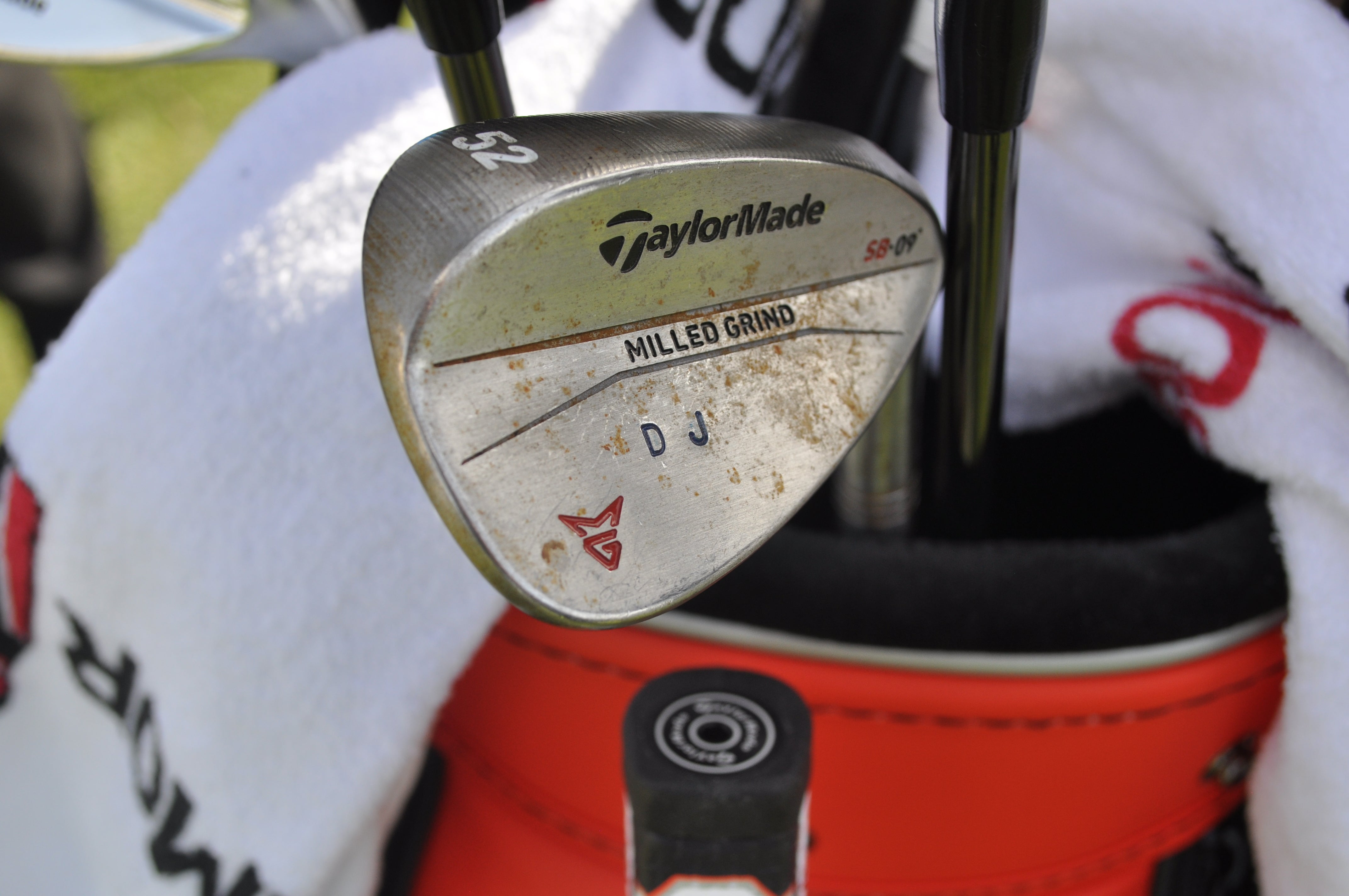 Dustin Johnson has his initials stamped on the head of his TaylorMade Milled Grind wedges. 