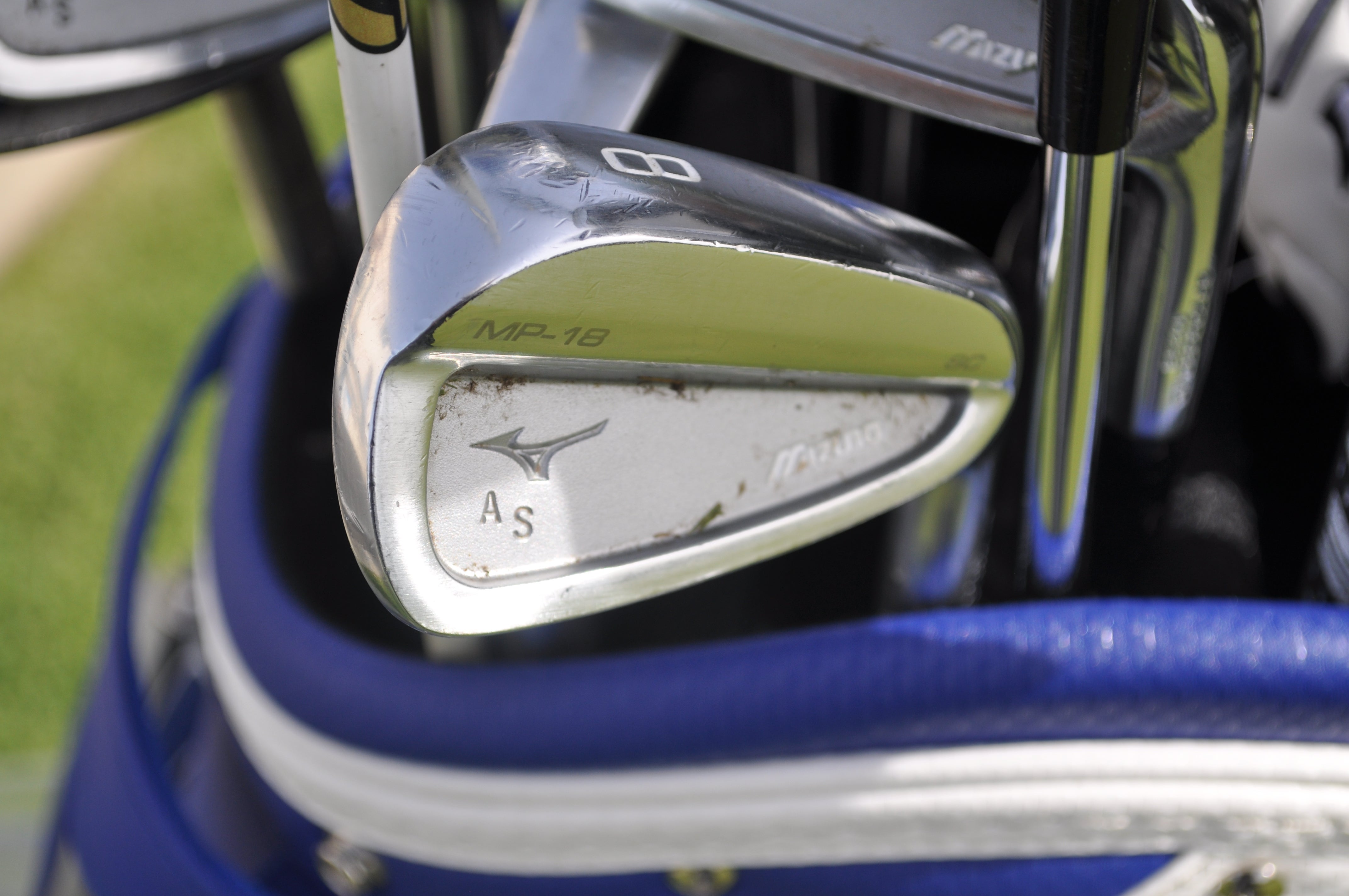 Adam Schenk's Mizuno MP-18 irons have his initials stamped in the cavity. 