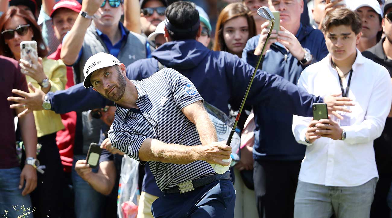 Dustin Johnson hits an approach during the final round of the WGC-Mexico Championship.