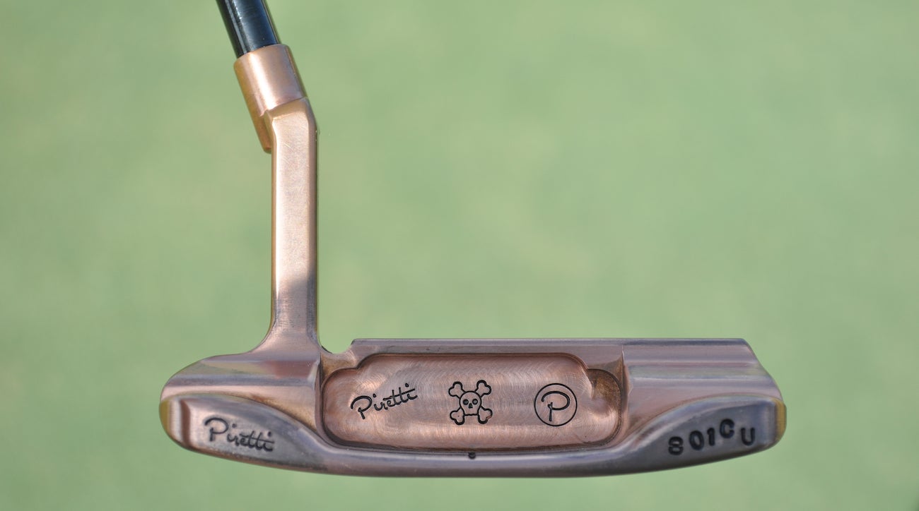 The "801CU" stamped on the bumper of this Anser-style Piretti putter denotes the copper material used to create the head. 